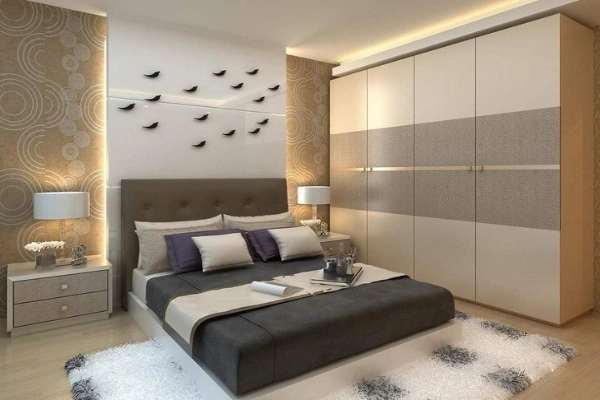 A Bedroom with accent wall and floor-to-ceiling wardrobe